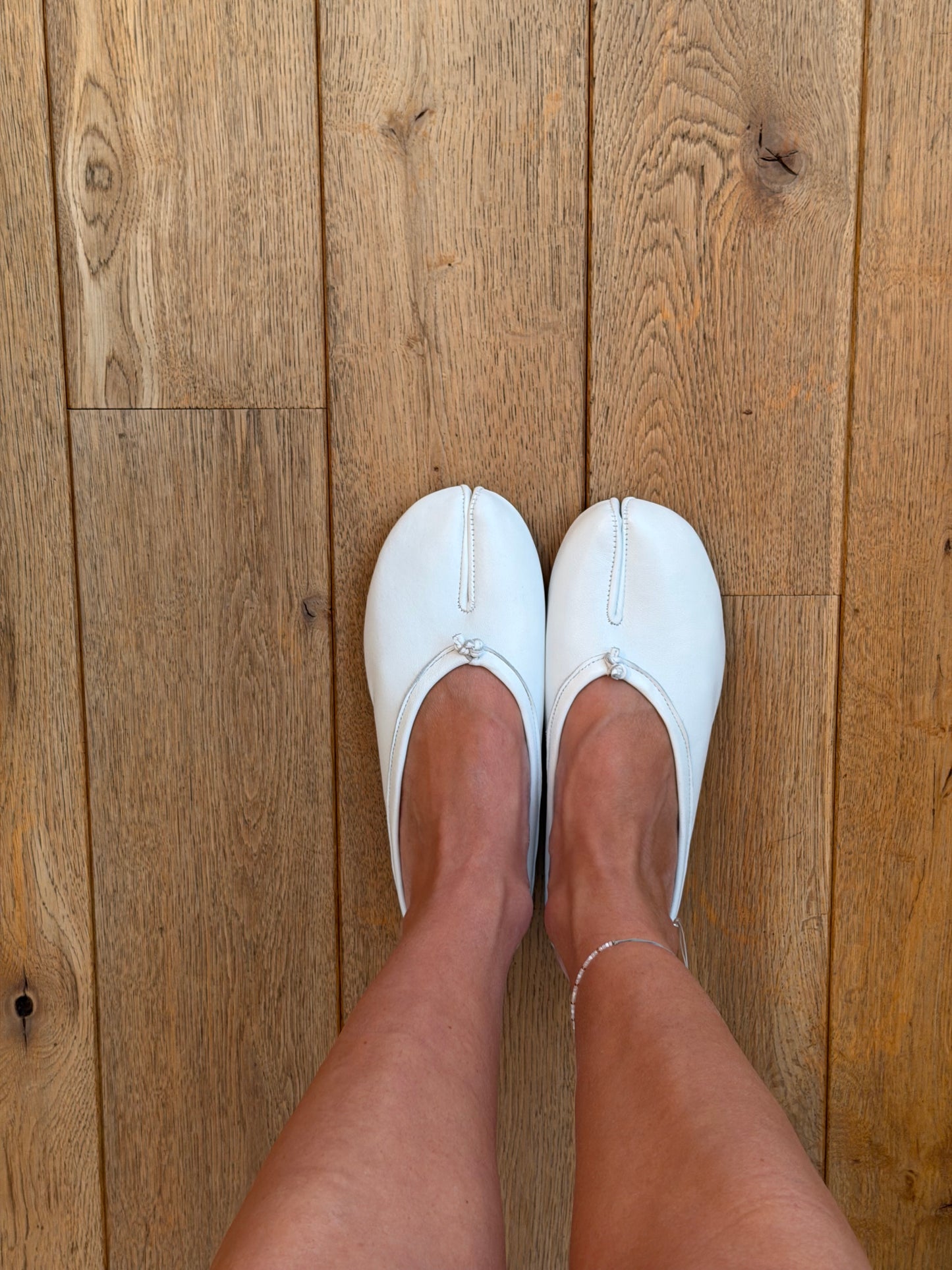 White backless ballet shoes