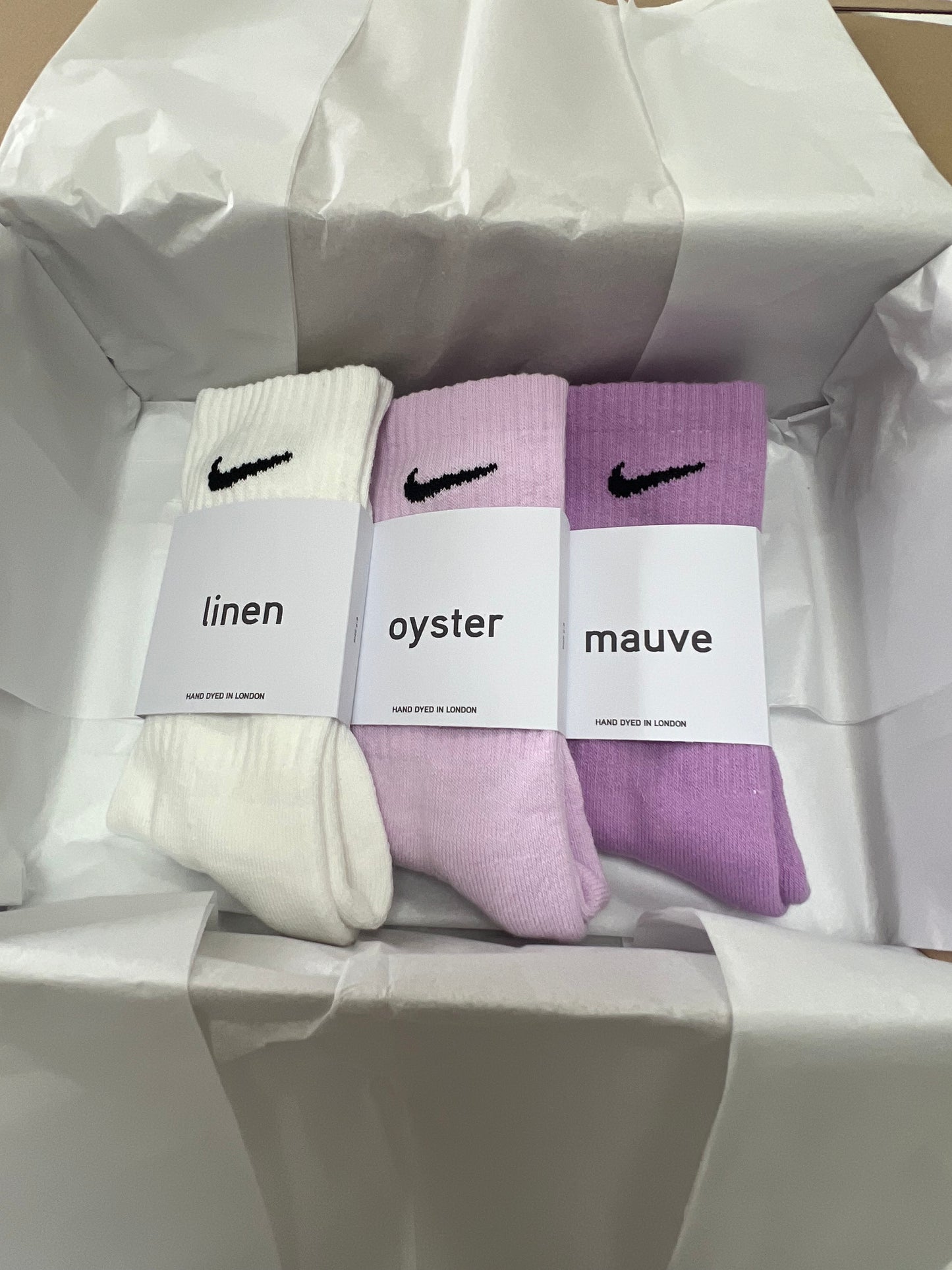 3 pairs Nike crew socks. 3 pack Nike everyday crew socks. Hand dyed colours.