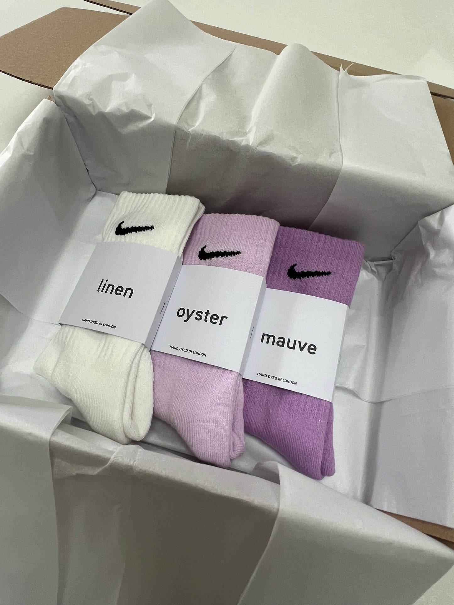 3 pairs Nike crew socks. 3 pack Nike everyday crew socks. Hand dyed colours.